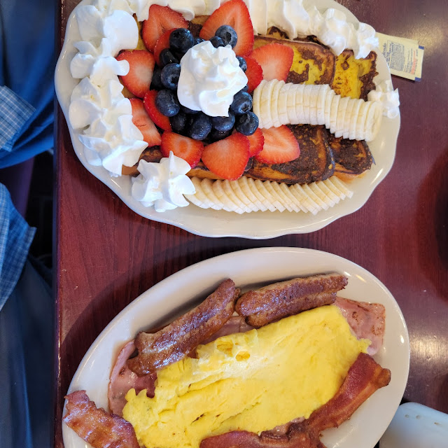 Hungry Man with French Toast with Fruit and Whip