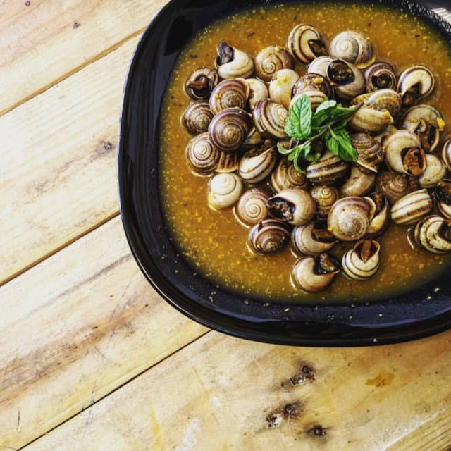 Caracoles En Salsa Picante