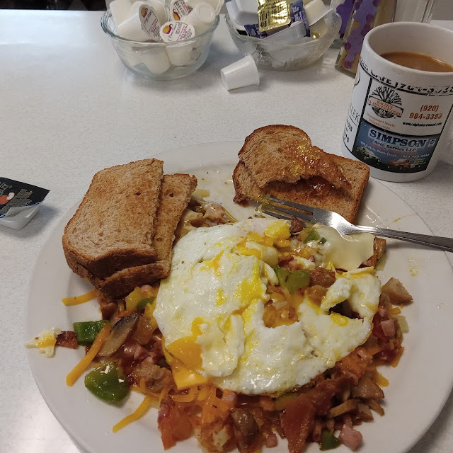 Black Creek Omelette with Hash Browns Cup of Coffee