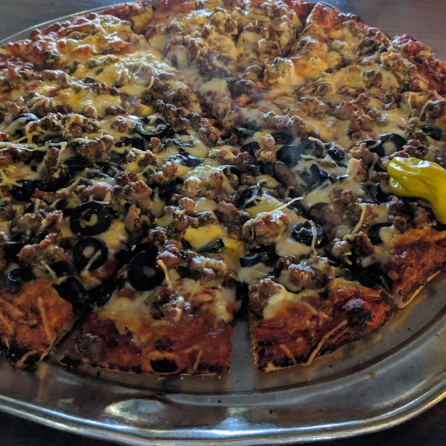 Sausage and Black Olive Pizza