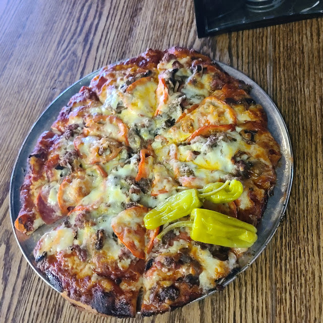 Meat Lovers Pizza 1 Added Maters and Mushroom Pizza