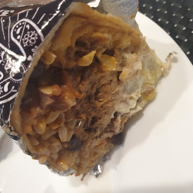 Beef Burrito Load It- Guacamole Sour Cream and Crushed Corn Chips Inside of Burrito