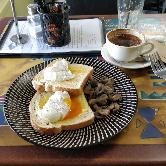 Poached Eggs on Toast with a Side of Mushrooms