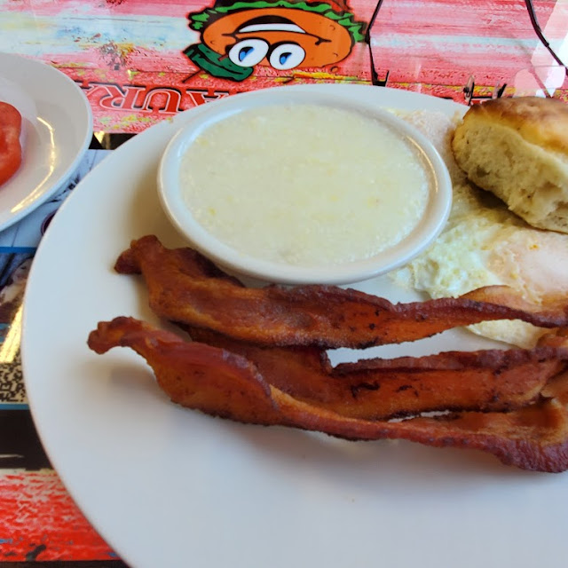 Basic Breakfast with 2 Eggs over Medium Bacon Grits and Tomatoes