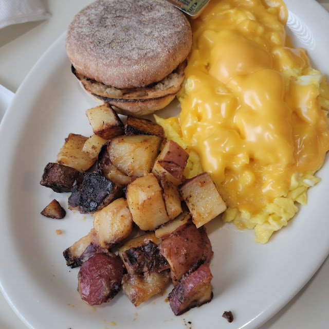 Scrambled Eggs with Cheese English Muffin and Home Fries