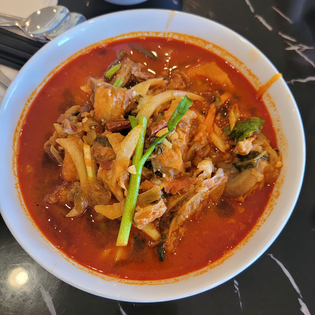 Spicy Pork Back-Bone and Seafood Noodle Soup