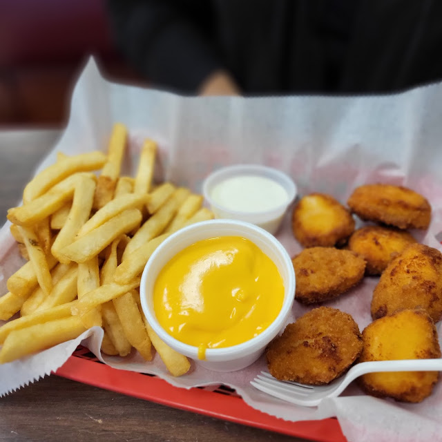 Chicken Nuggets with Fries with Cheese
