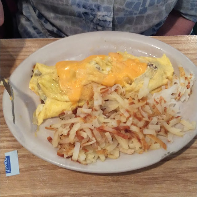 Bacon Cheeseburger Omelette with Hash Browns