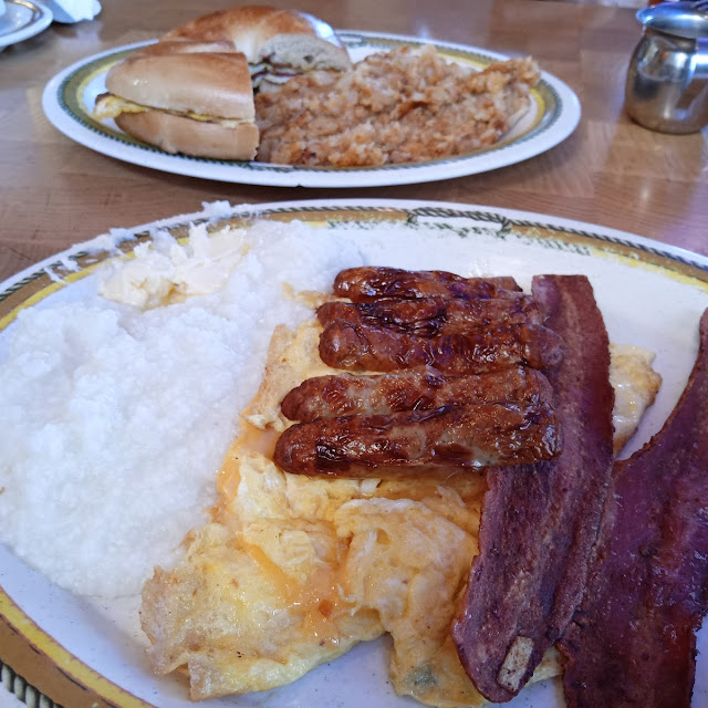 Beef Sausage Links Scrambled Eggs with Cheese Turkey Bacon and Grits