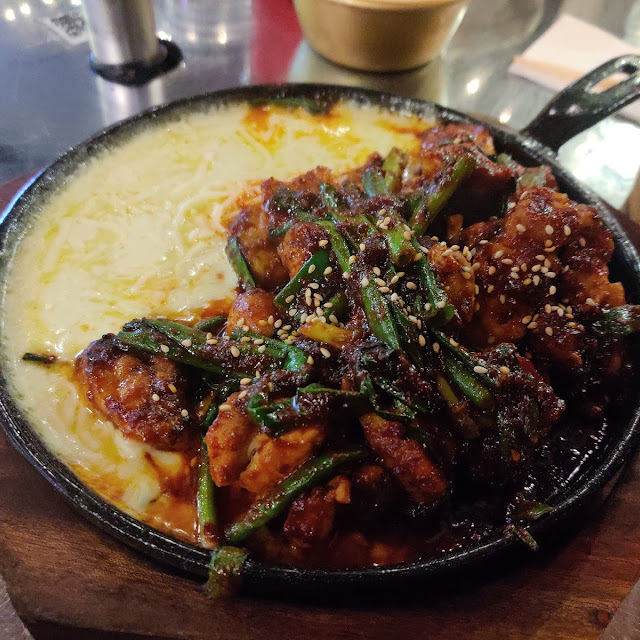 Fire Grilled Pork in Spicy Sauce Served with Mozzarella Cheese