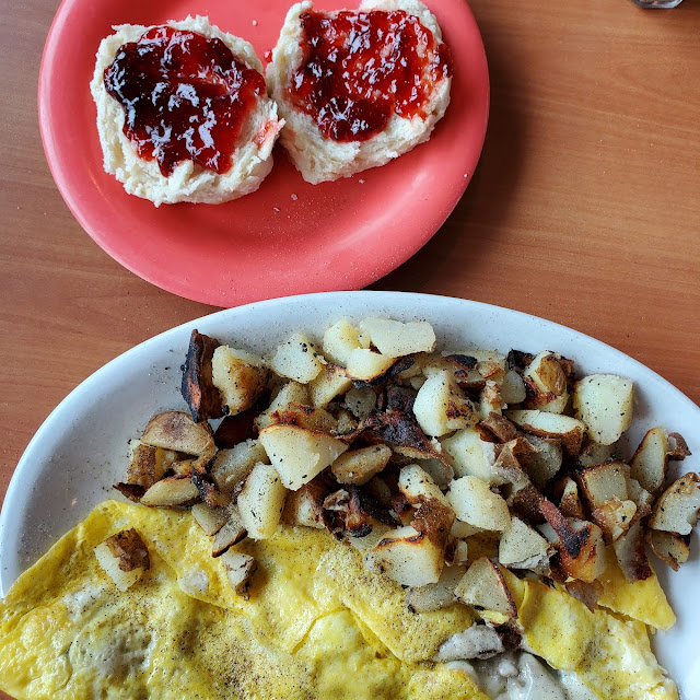 Sausage and Cheese Omelet with Home Fries and a Biscuit