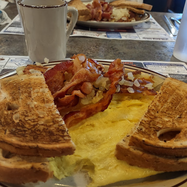 Eggs Toast Hash Browns and Country Fried Steak with Gravey