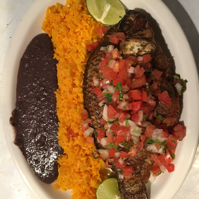 Fried Mojarra Served with Rice and Beans