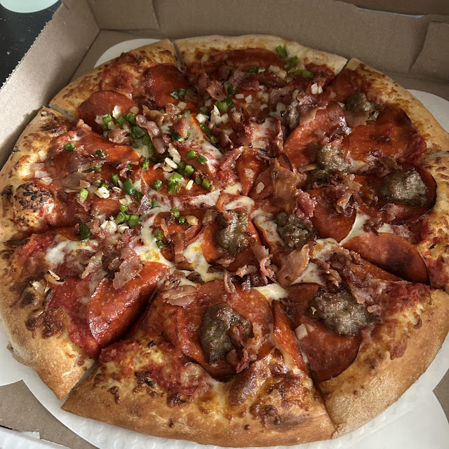 Half Pepperoni & Italian Sasuage & Bacon the Other Half Pepperoni Green Peppers Onions & Bacon