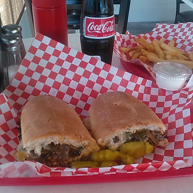 Philly Cheese Steak Sandwich and French Fries