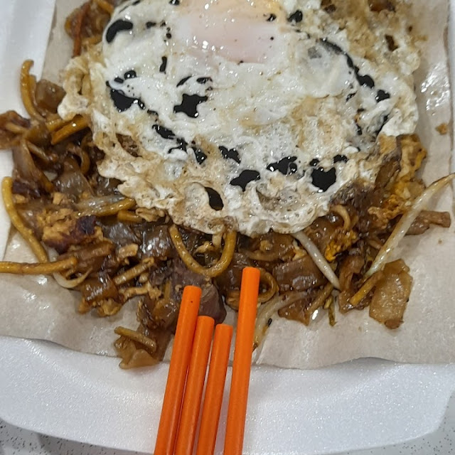 Fried Keoy Teow Flat White Noodles Top with Sunny Side Up