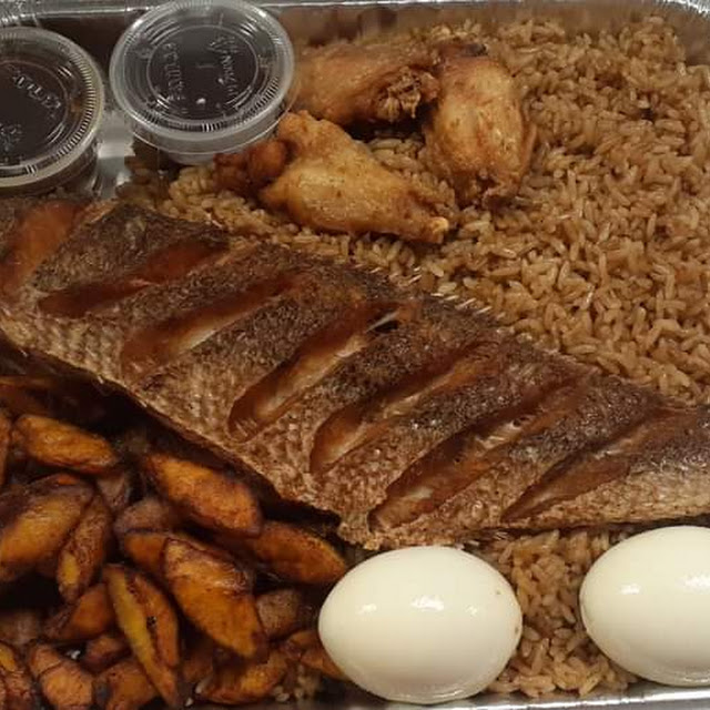Dried Rice Platter with Chicken Fish Fried Plantains 2 Boiled Eggs and Container of Pepper Sauce
