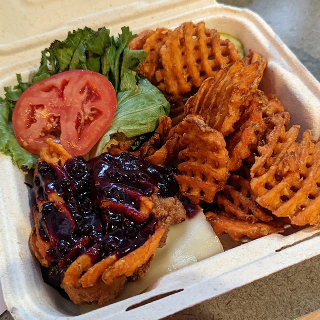 The Free Ranger Crispy Chicken Burger w Waffle Sweet Potato Fries and Blueberry Sauce