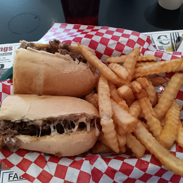 Cheese Steak Sandwich and Fries