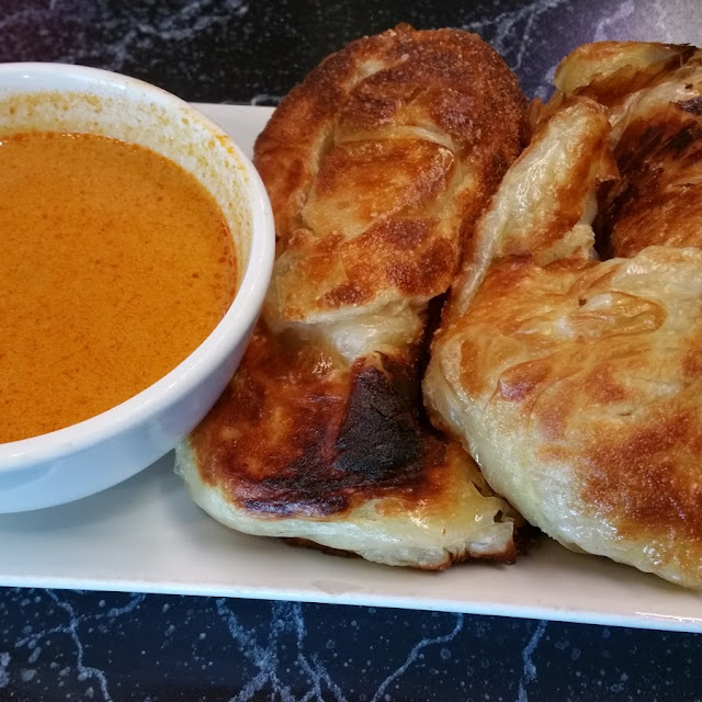 Large Roti Canai with Vegetarian Curry Sauce