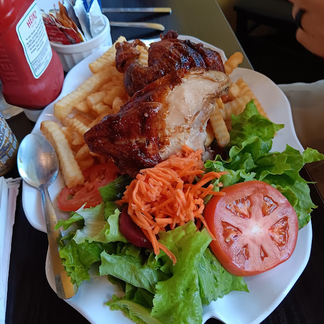 1 4 Pollo a La Brasa with French Fries and Salad or Rice