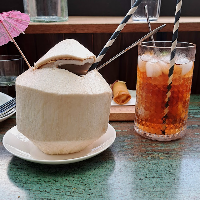 Cold Coconut Water and a Glass of Iced Peach Tea