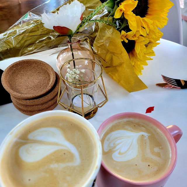 Caffe Latte and a Regular Coffee with Cream