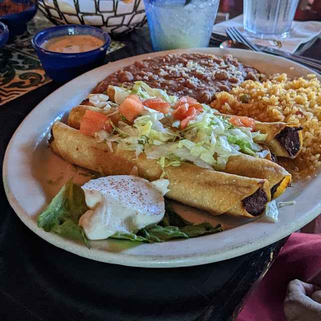Pork Tamale and Beef Enchilada with Tomatillo Sauce