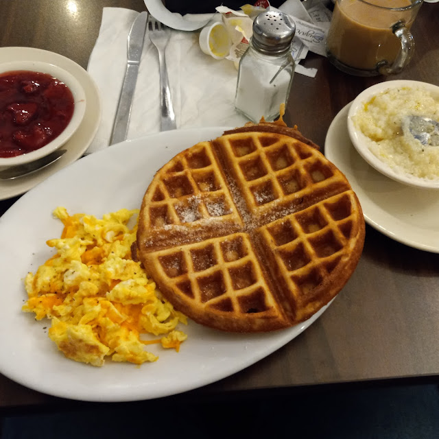 Waffles Cheese Eggs Grits a D Strawberry Fruit Spread Coffee