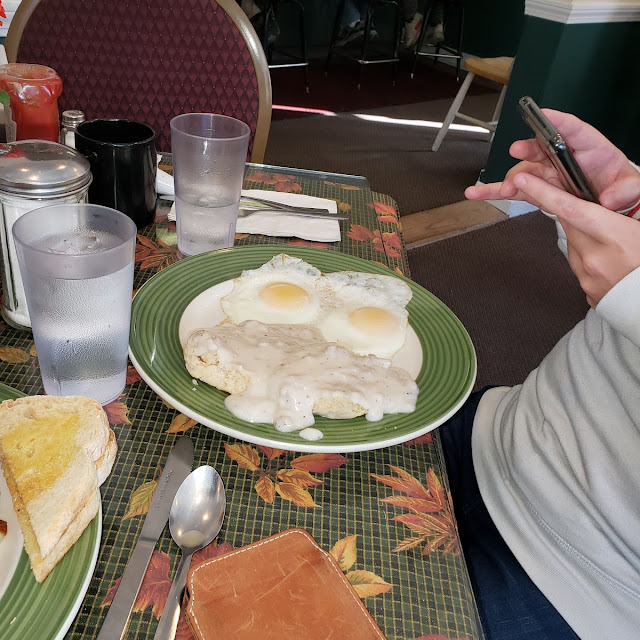 Sausage Gravy and Biscuits with 2 Eggs over Easy