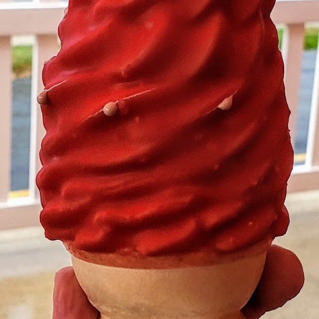 Chocolate Ice Cream Cone with Cherry Dip