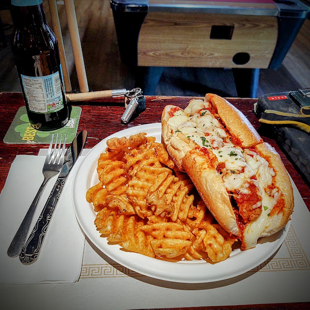 Chicken Parm Served on Garlic Bread with Waffle Fries