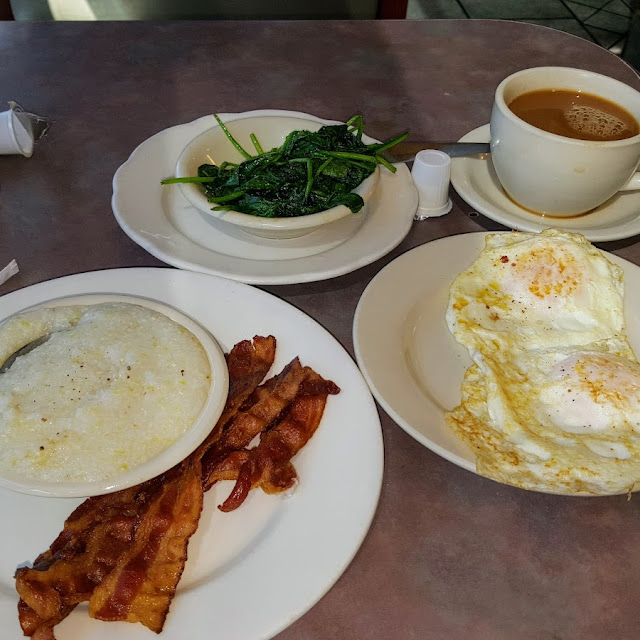 The Jacque Howard 2 Eggs over Med Bacon Grits Side of Sauteed Spinach