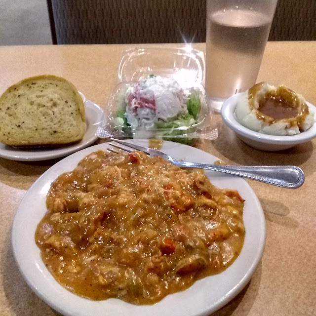 Crawfish Etouffee Mashed Potatoes and Gravy Garlic Bread and a Salad