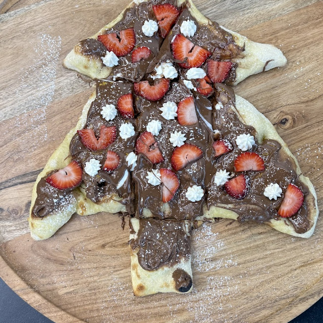Nutella Mascarpone Pistachio and Strawberry Pizza Topped with Biscoff