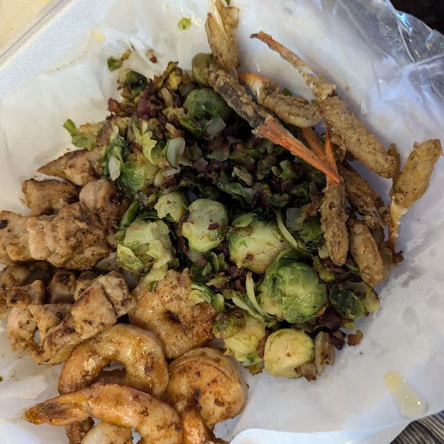 Grilled Shrimp Grilled Gator Bites Fried Crab Claws and Grilled Brussel Sprouts