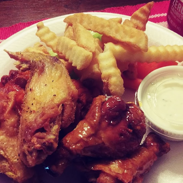 Lemon Pepper Wings and Hot Wings with Fries