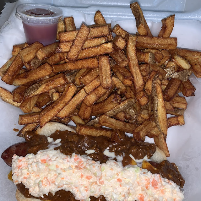Loaded Sausage Dog with Homemade Fries and Coleslaw