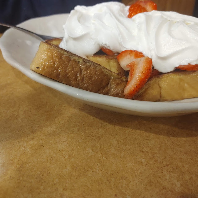 French Toast with Whip Cream and Strawberries