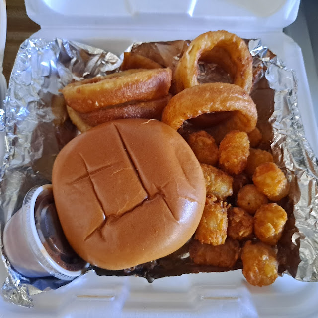 Brisket Sandwich with Onion Rings and Tater Tots