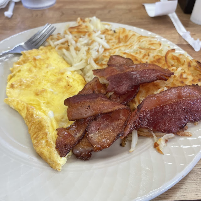 2 Eggs Scrambles Bacon and Crispy Hash Browns