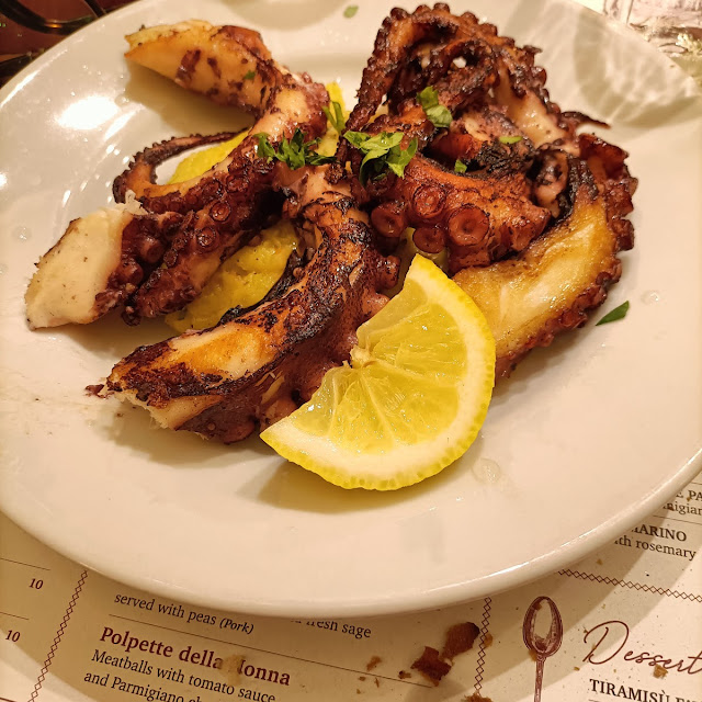 Polpo Arrosto Servito Con Tortino Di Patate Roast Octopus With Potato Pie