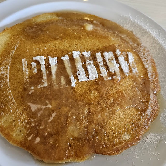 Signature Pancake with Syrup and Powdered Sugar