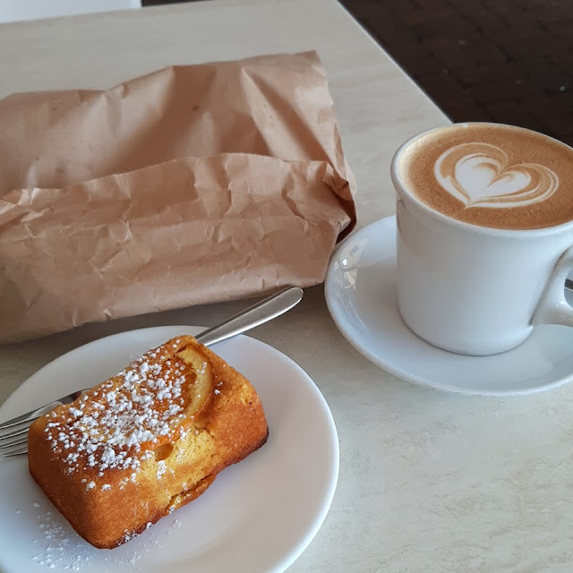 Large Flat White and Orange Cake