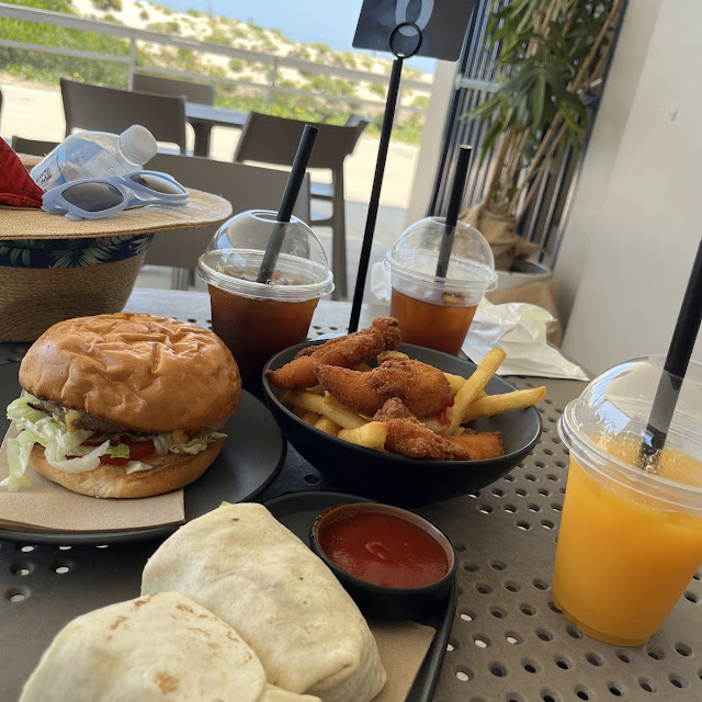 Beef Burger Chicken Nuggets with Fries Iced Long Black and Fresh Orange Juice