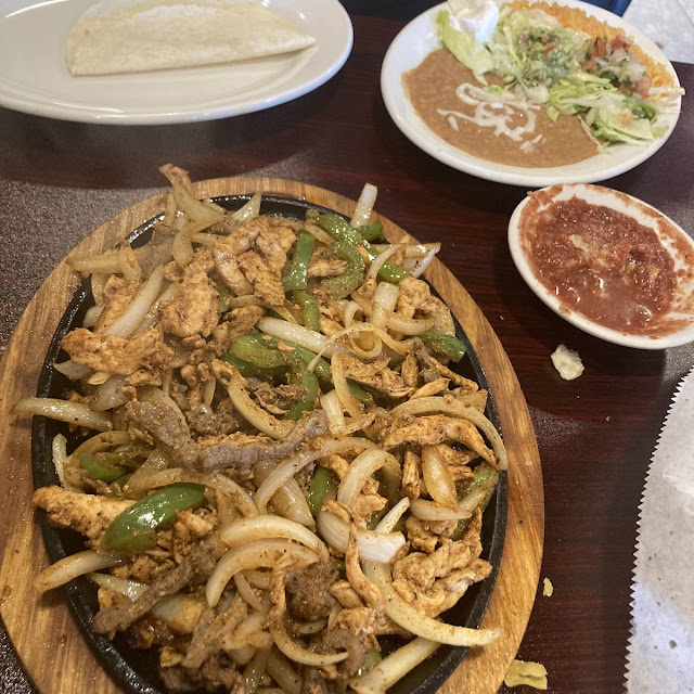 Fajita Jalisco with Onion & Bell Peppers Steak Chicken & Shrimp Served with Rice Beans & Tortillas