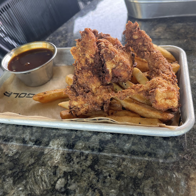Chicken Strips and Fries with BBQ Sauce