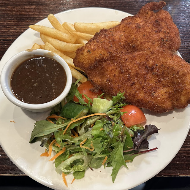 Chicken Schnitzel with Chips Gravy and Salad