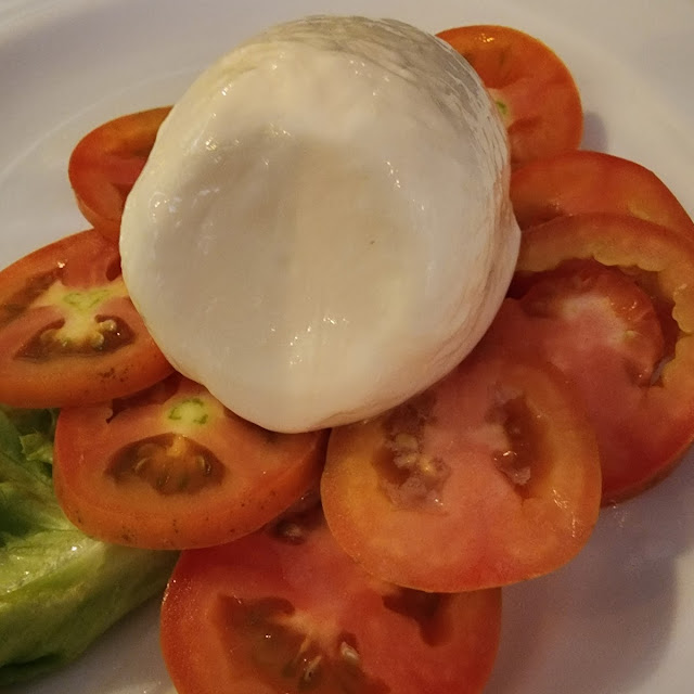 Fresh Burrata with Anchovies with Dry Tomatoes & Pickled Artichokes
