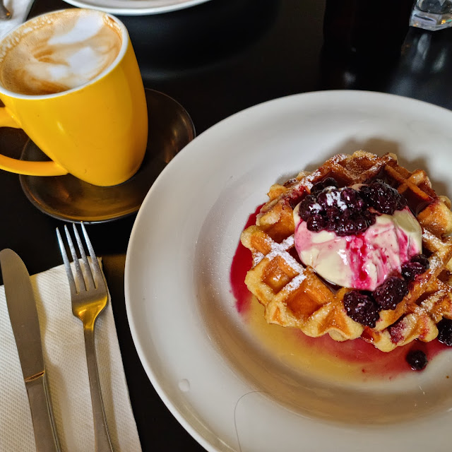 Waffles and a Skim Flat White in a Mug